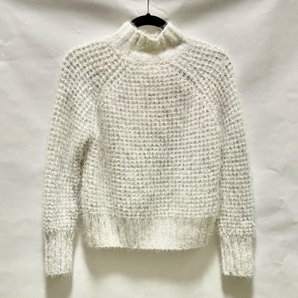 Womens white fuzzy sweater in size